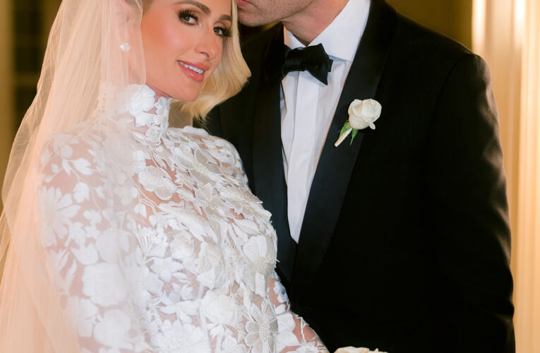 Paris Hilton posts pictures in her wedding dress after marrying Carter Reum